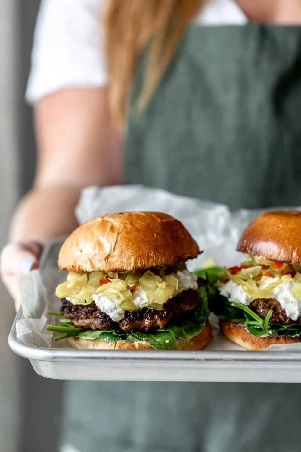 chorizo goat cheese burger with tomato chow chow on brioche buns recipe