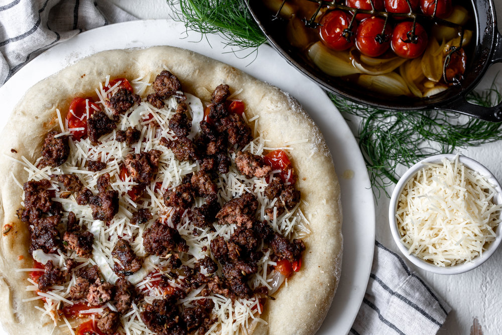 par baked crust pizza with lamb merguez sausage 