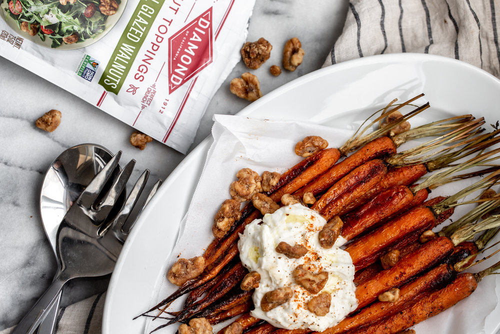 roasted carrots topped with creamy burrata cheese and crispy, glazed walnuts