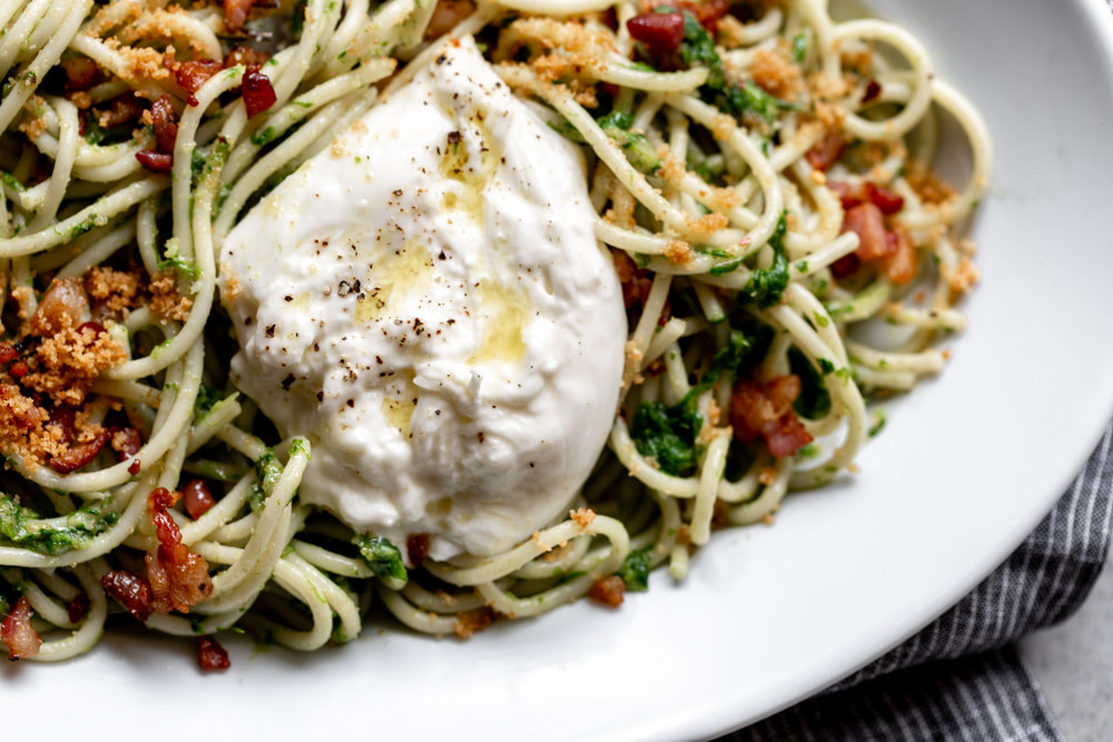 closeup burrata topped ramp pesto pasta