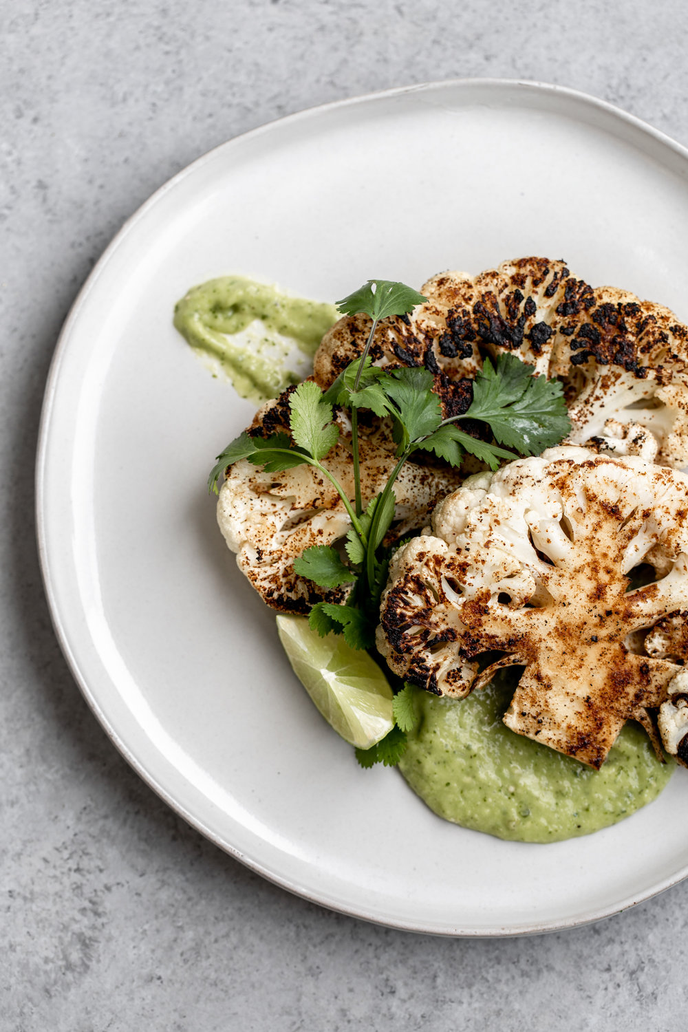 Cauliflower “Steaks” with Avocado-Tomatillo Salsa recipe