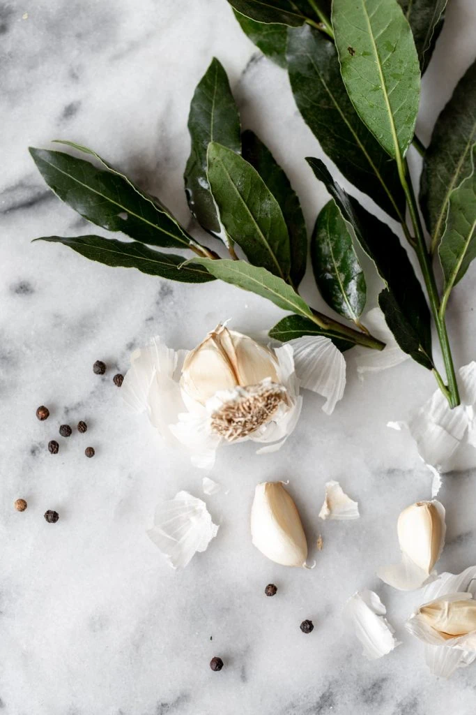 aromatics used in filipino chicken adobo bay leaves garlic and black peppercorns