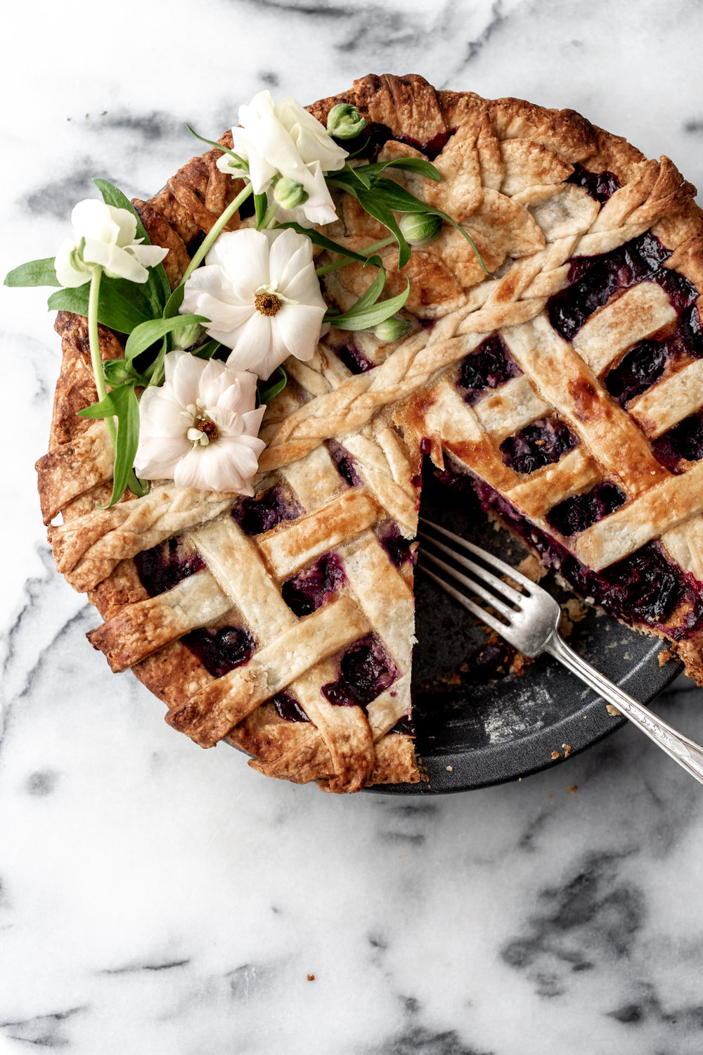 A classic pie crust with a blueberry lavender honey filling for unique and fruity spring or summer pie recipe.