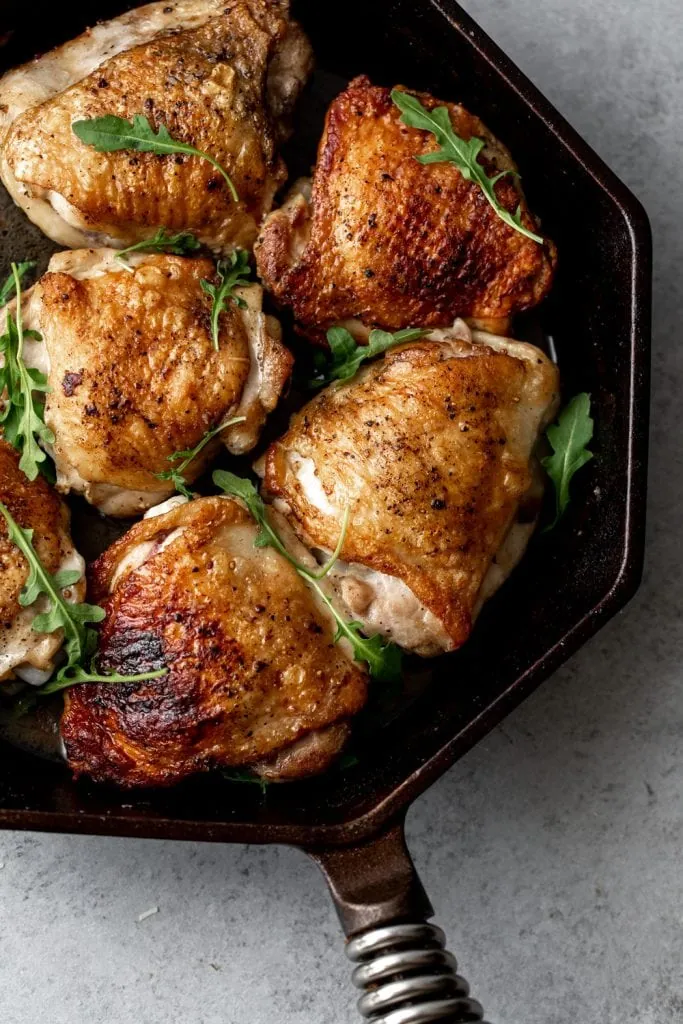 simple cast iron chicken thighs with salt and pepper