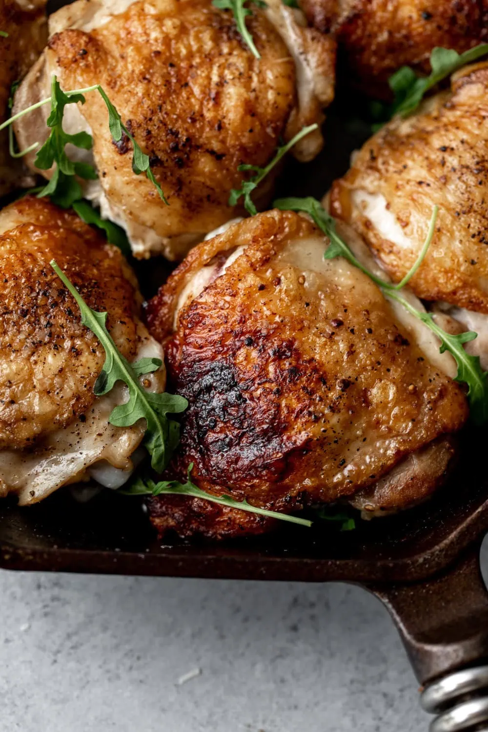 Simple Salt & Pepper Cast Iron Chicken Thighs closeup
