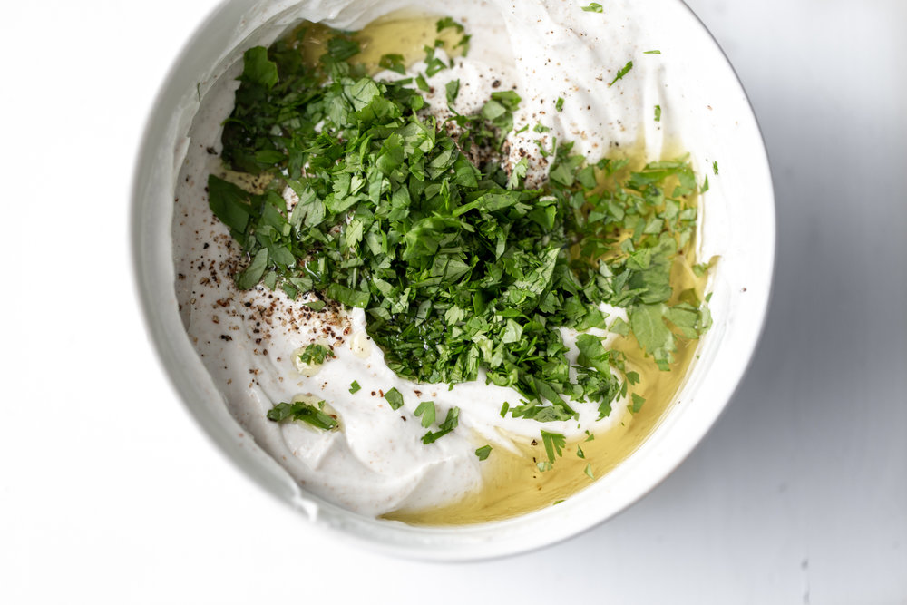 herbed yogurt sauce cooking with cocktail rings