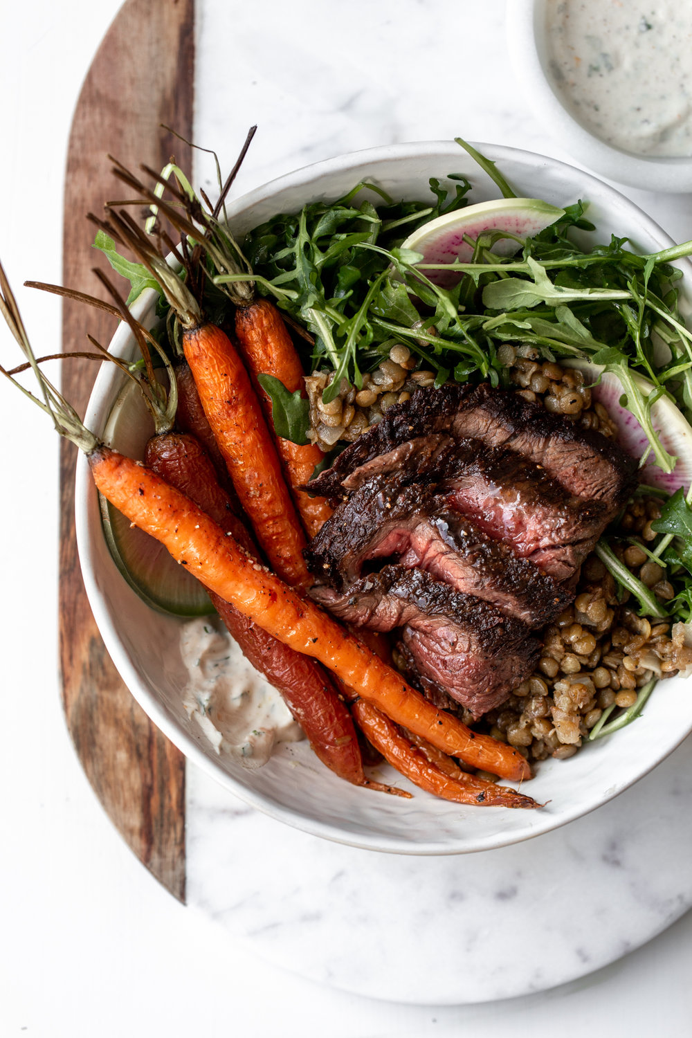 refried lentils with steak and arugula grain bowl recipe from cooking with cocktail rings