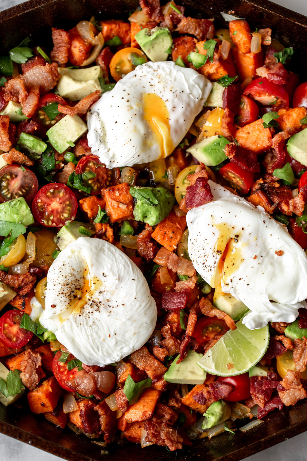 sweet potato and bacon hash recipe with poached eggs avocado and tomatoes 