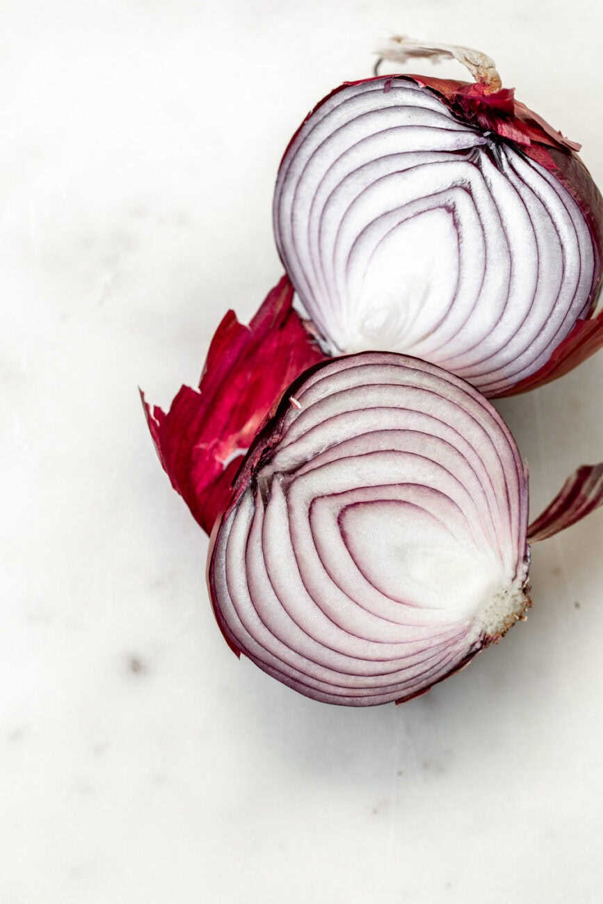 halved red onions.