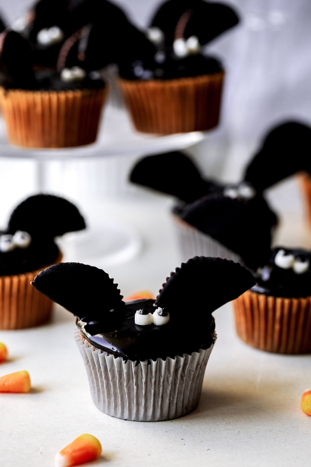 Chocolate Peanut Butter Bat Cupcakes halloween holiday recipe from cooking with cocktail rings closeup