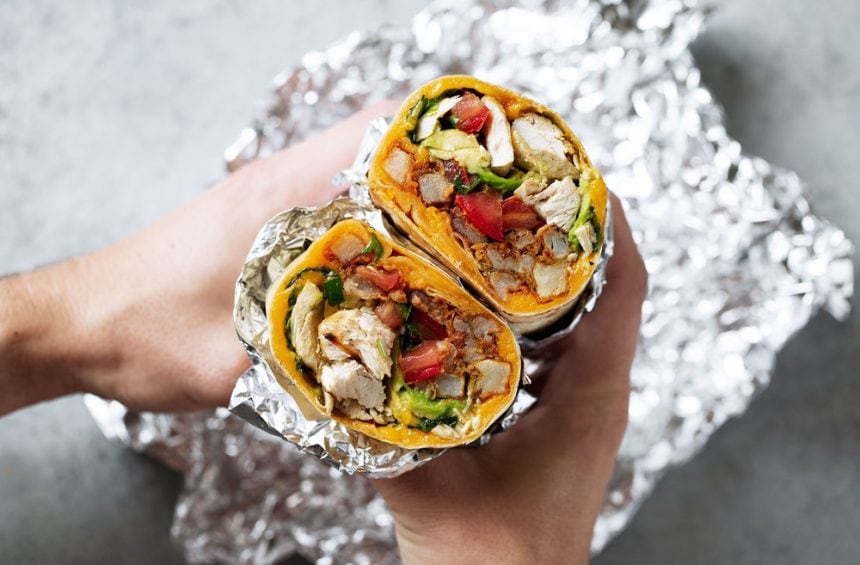 California chicken burrito with seasoned fries and avocado.