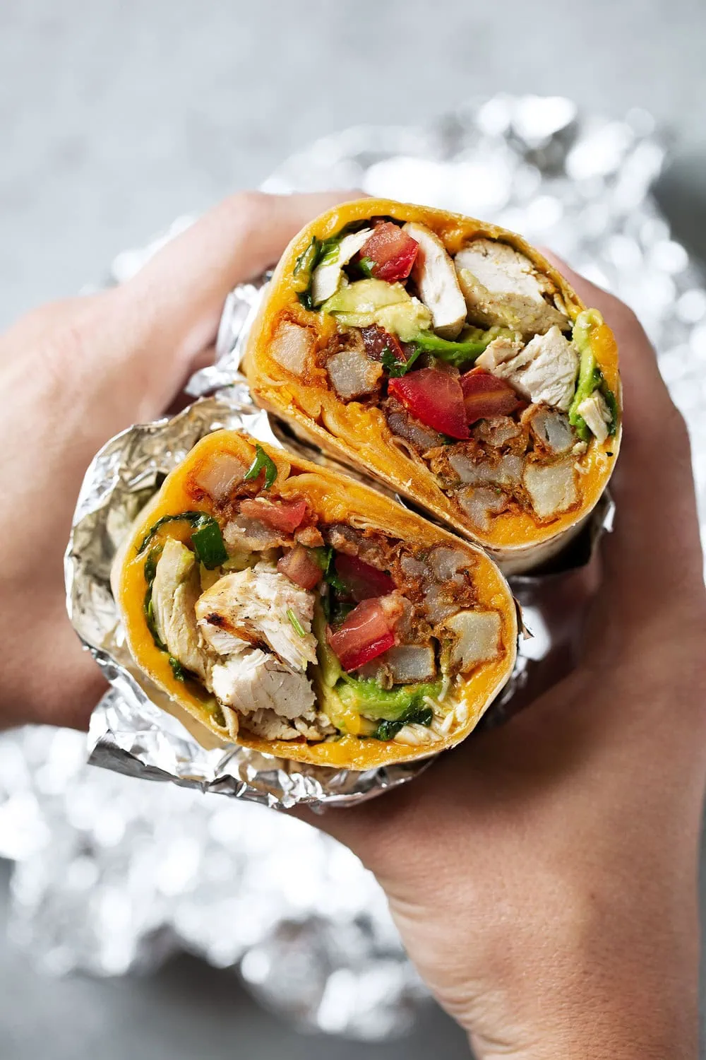 California chicken burrito with seasoned fries halved