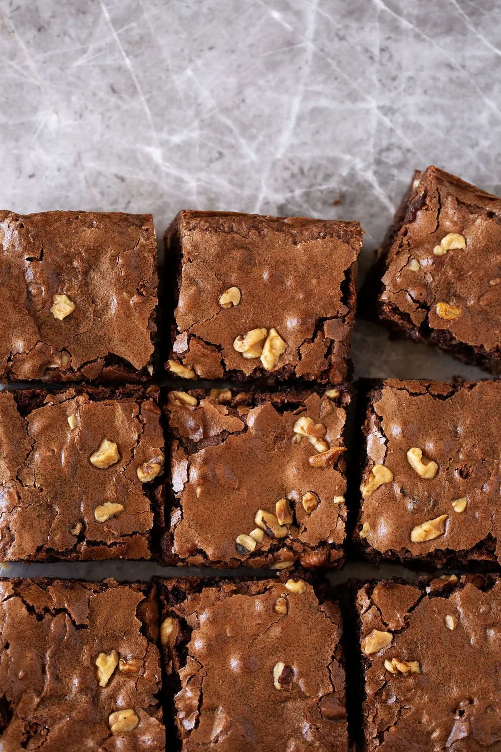 mexican hot chocolate brownies with walnuts cut into squares