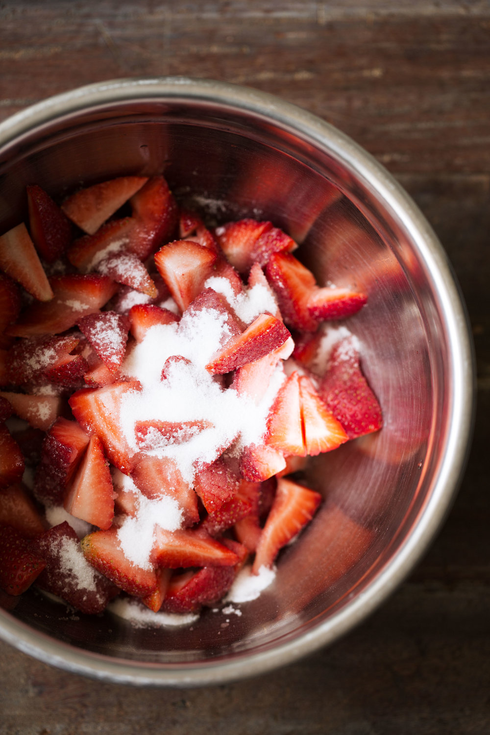 sliced strawberries with sugar mascerated