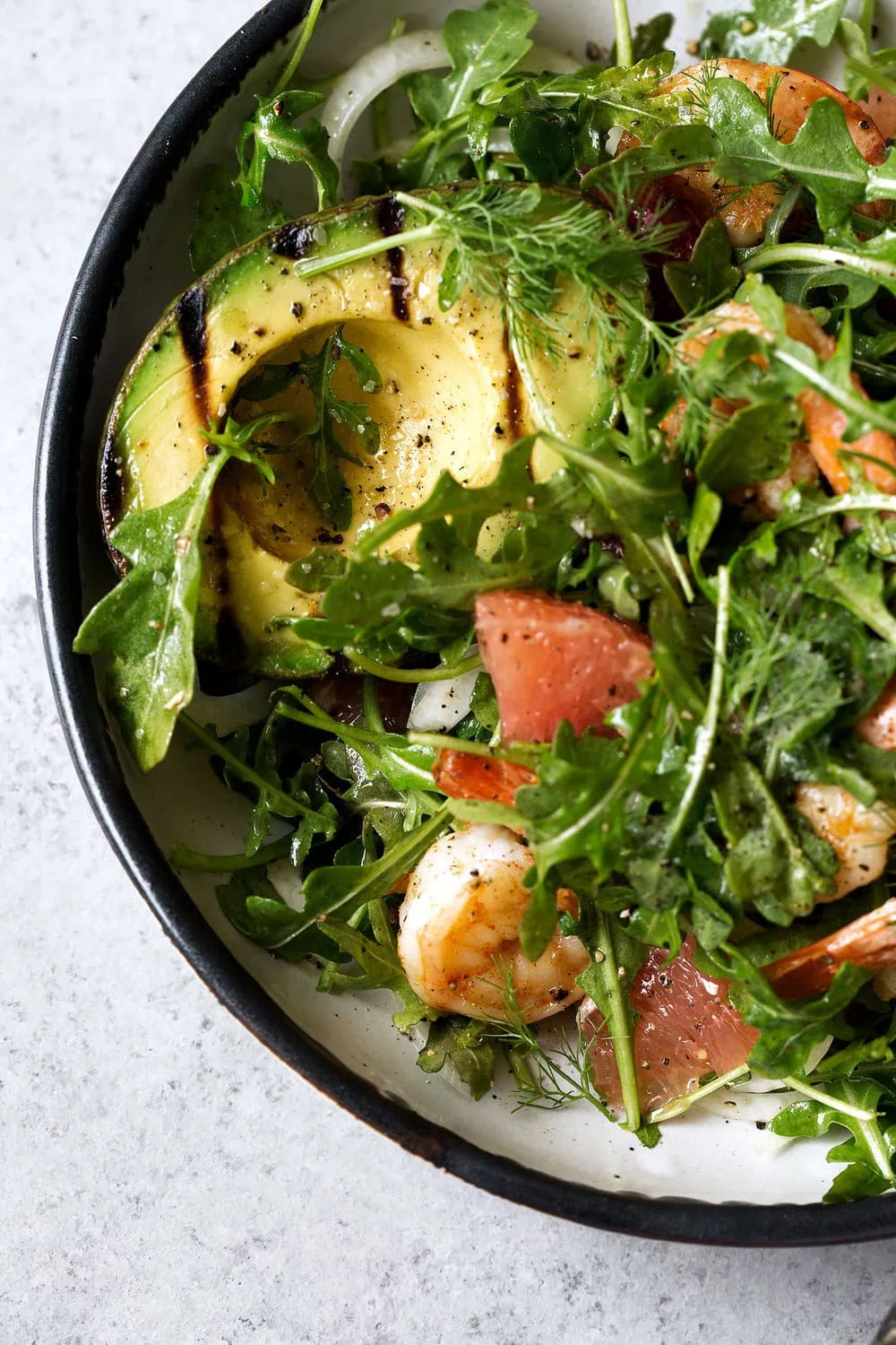 Avocado & Shrimp Salad with Winter Citrus Dressing closeup cooking with cocktail rings