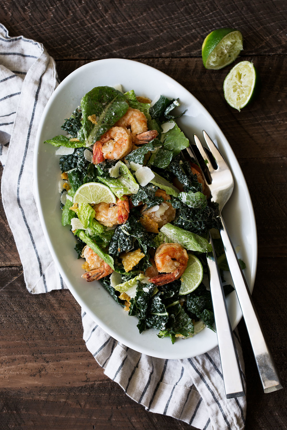 Kale Caesar Salad with Lime and Crispy Shrimp recipe from cooking with cocktail rings overhead shot