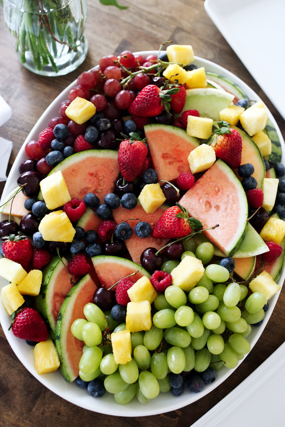 fruit salad with watermelon strawberries melon pineapple cherries and blueberries
