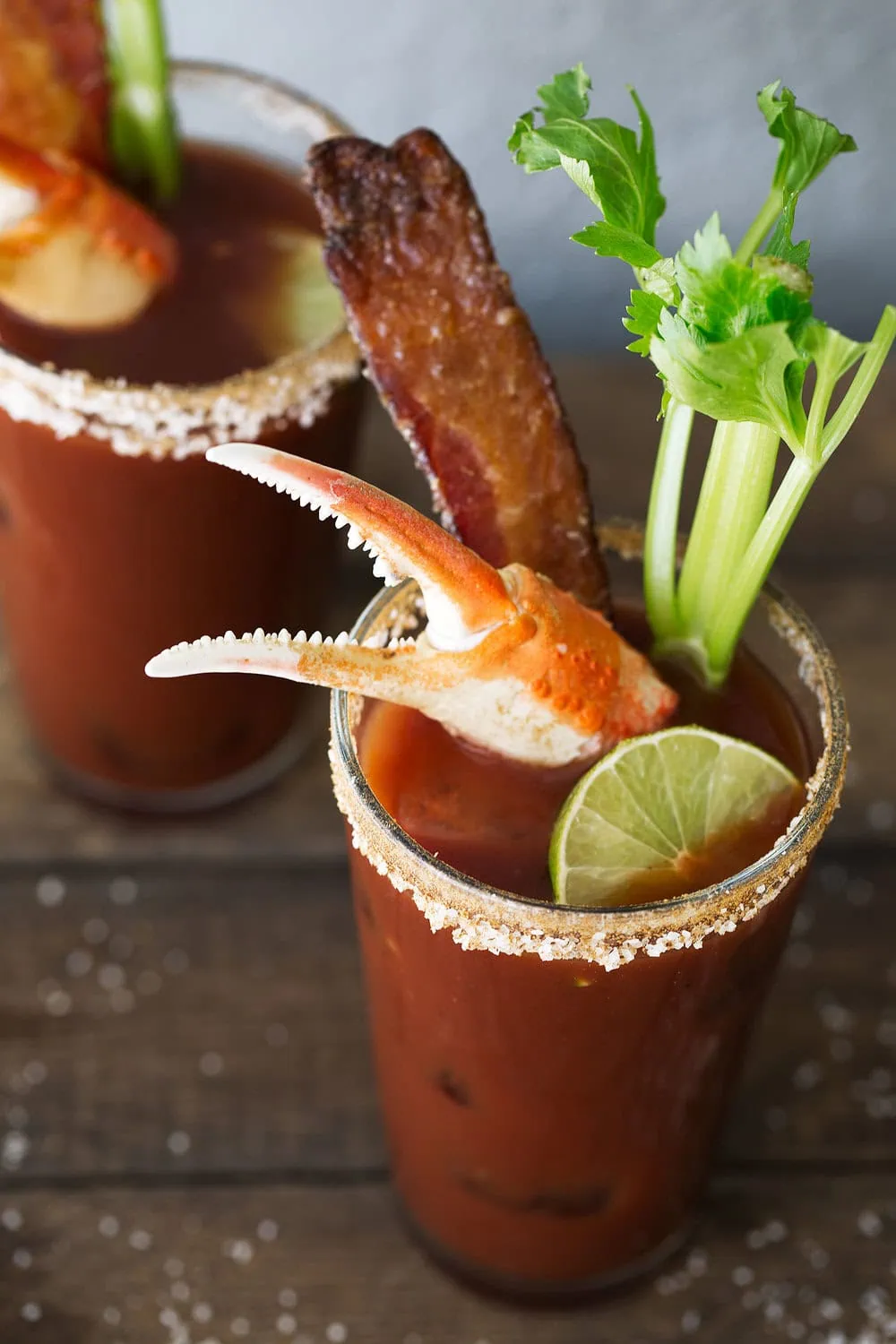 Loaded old bay bloody mary with candied bacon and snow crab claw