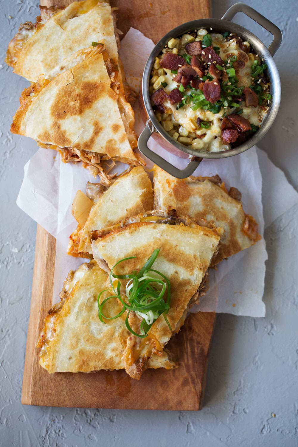 korean braised pork and kimchi quesadilla cooking with cocktail rings