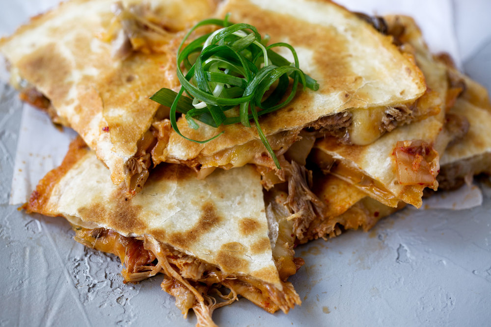 korean braised pork and kimchi quesadilla cooking with cocktail rings