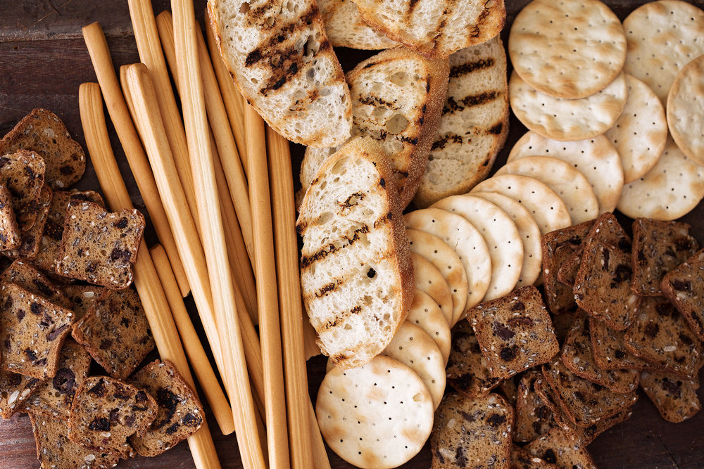 assorted crackers and breadsticks