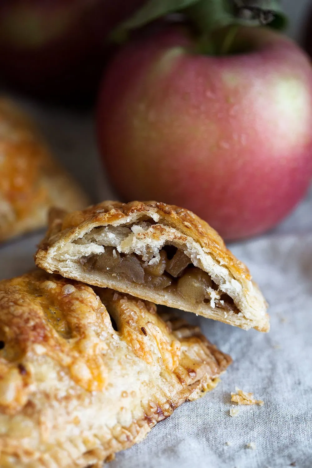 closeup opened up cheddar apple hand pies halved