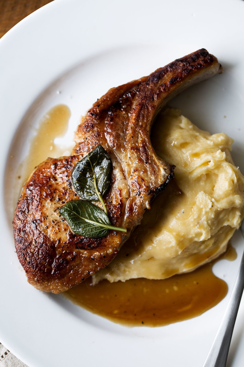 apple cider and sage glazed pork chops with whipped cheddar potatoes