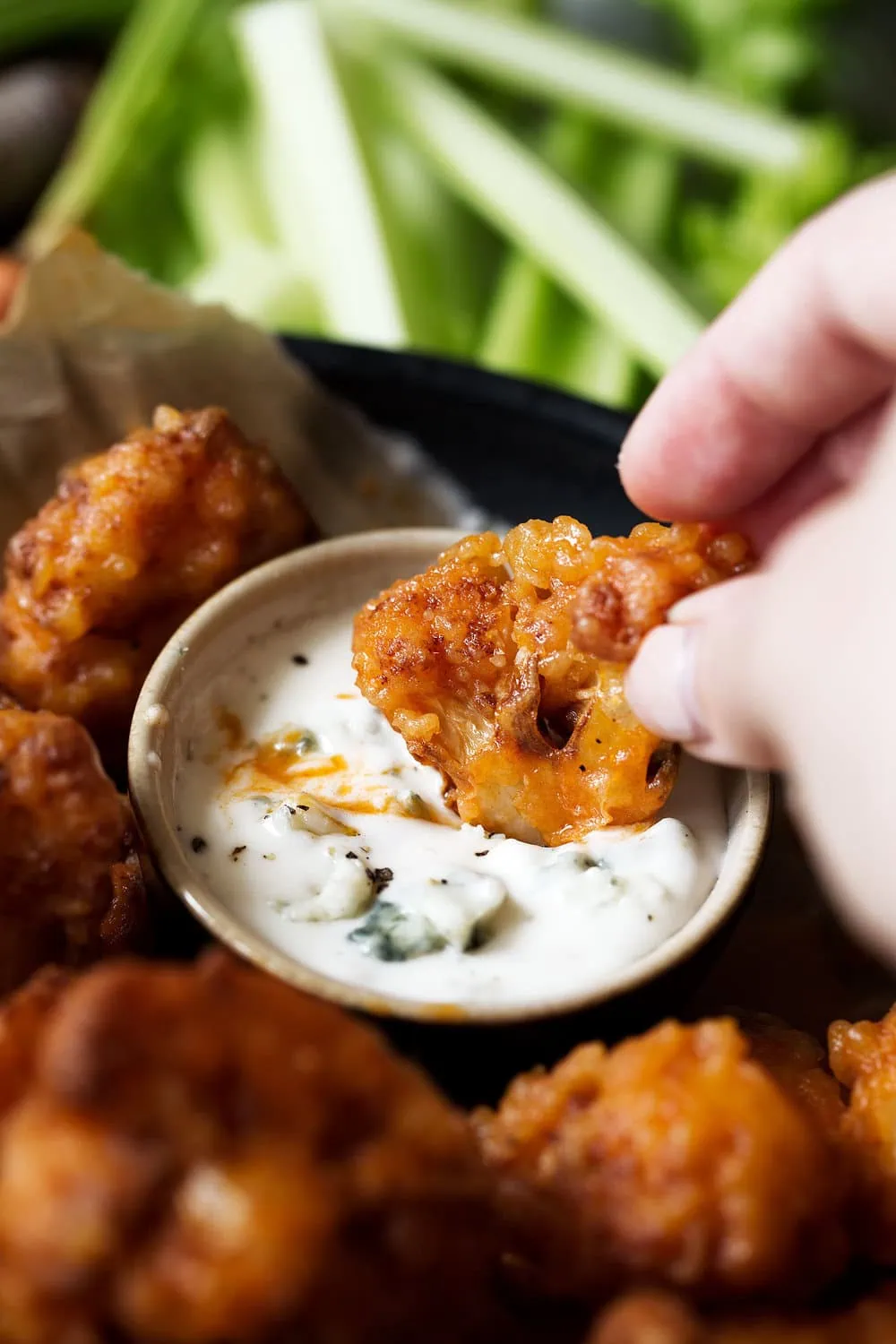 vegetarian Crispy battered and fried cauliflower bites tossed in buffalo sauce