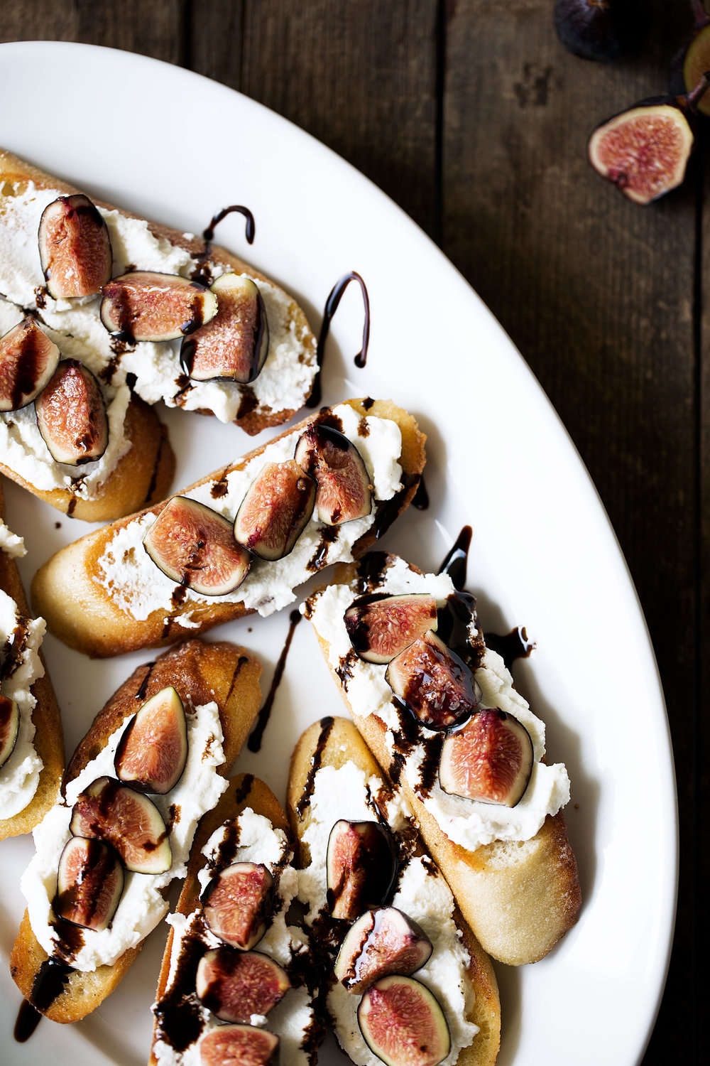 crostini with ricotta, figs and balsamic cooking with cocktail rings closeup