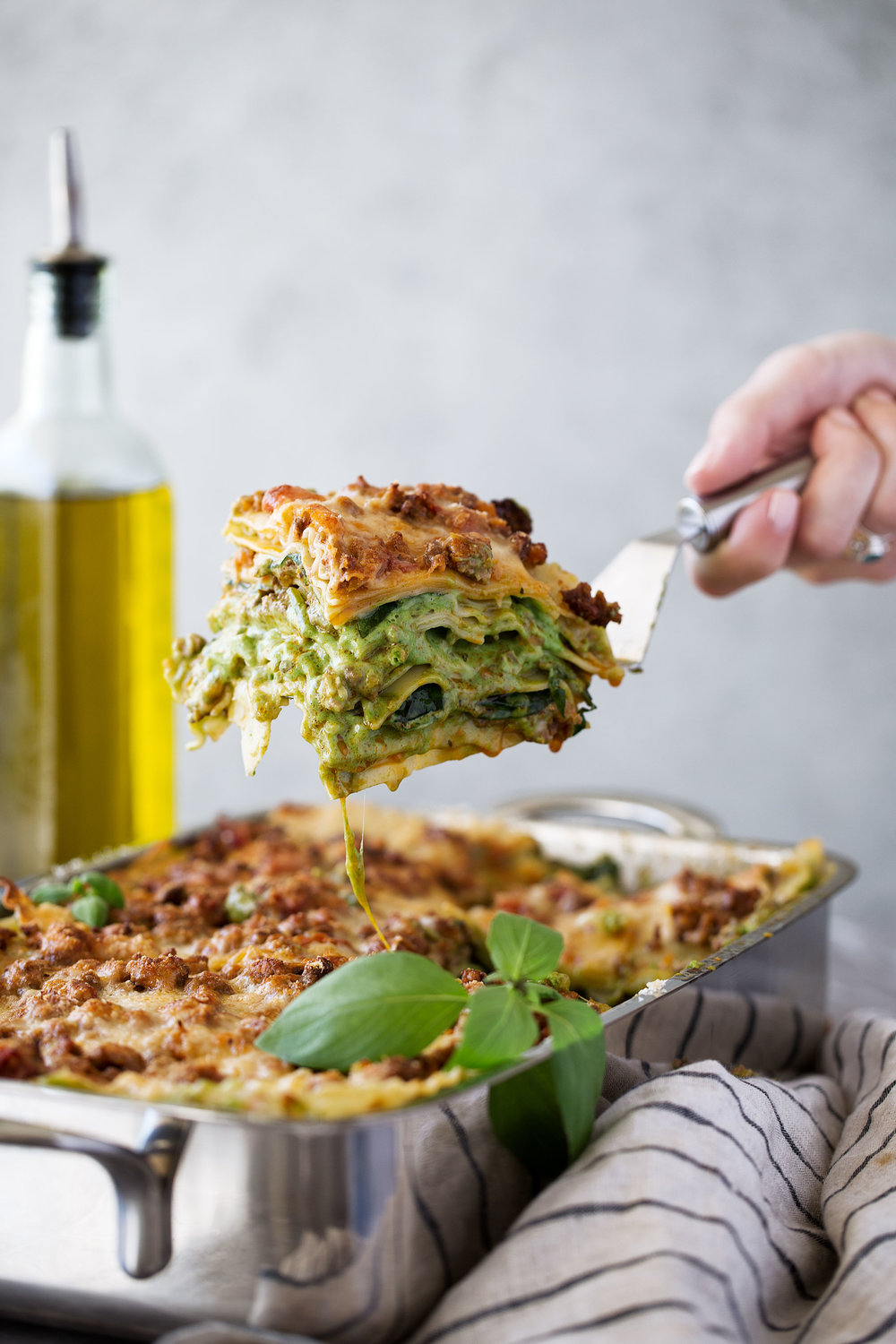 lasagna verde recipe slice on spatula