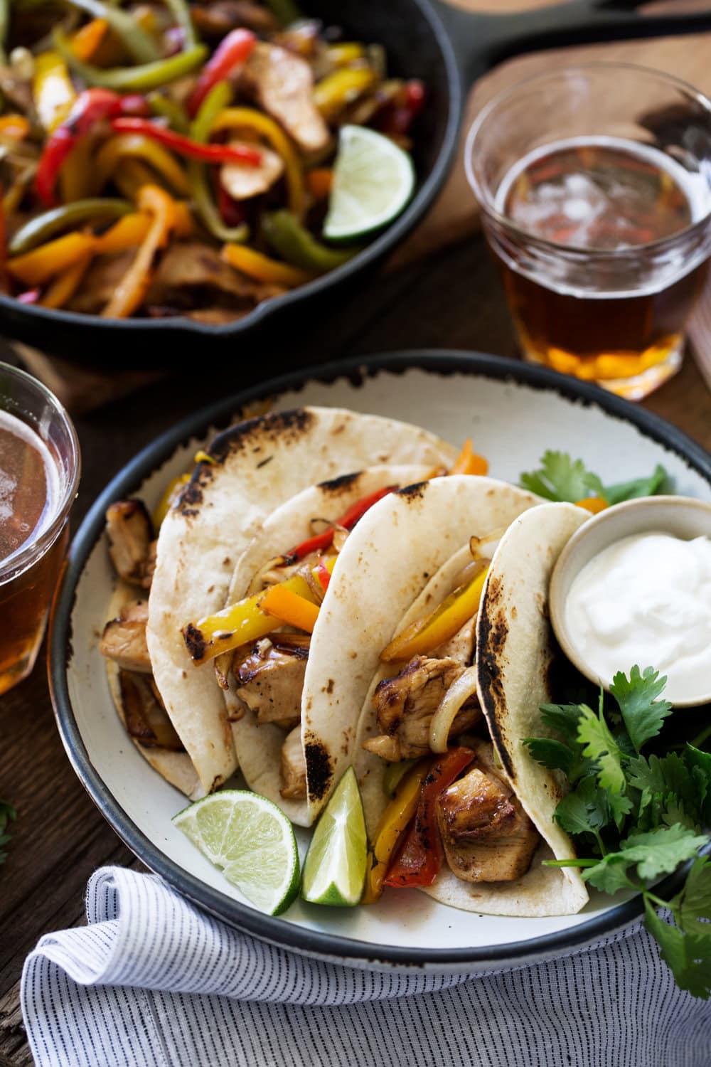 Tequila lime chicken fajitas cooking with cocktail rings