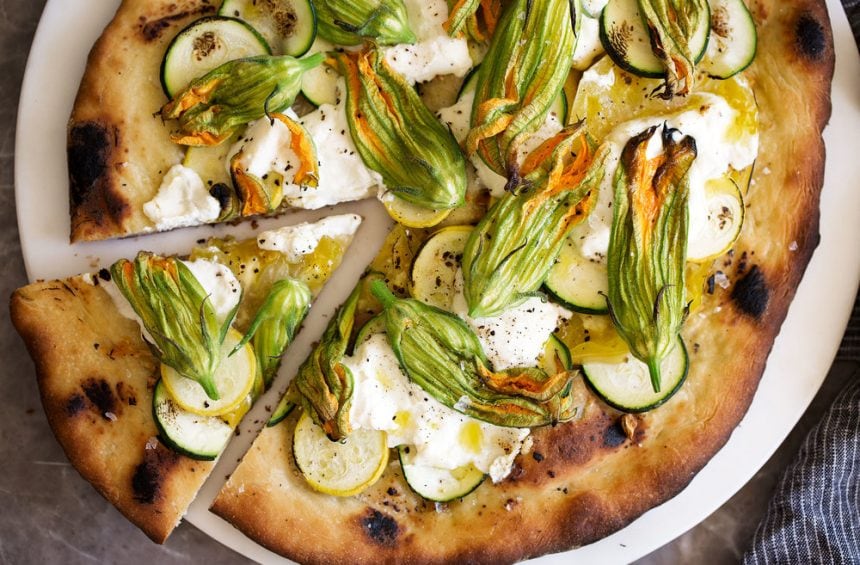 squash blossom and ricotta pizza with zucchini.
