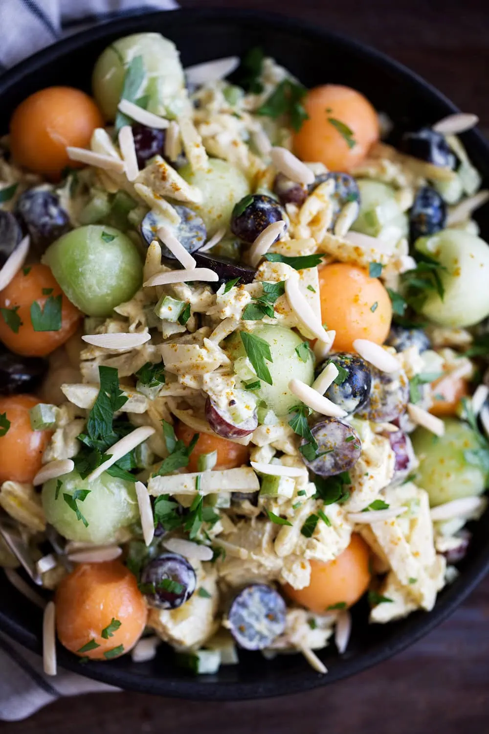 Indian Curry Chicken Salad with Melon & Almonds cooking with cocktail rings/ diamond of california