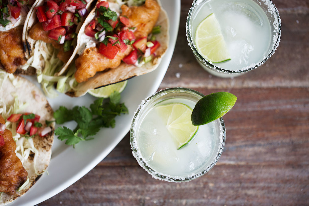 mezcal margaritas with lime and salt rim