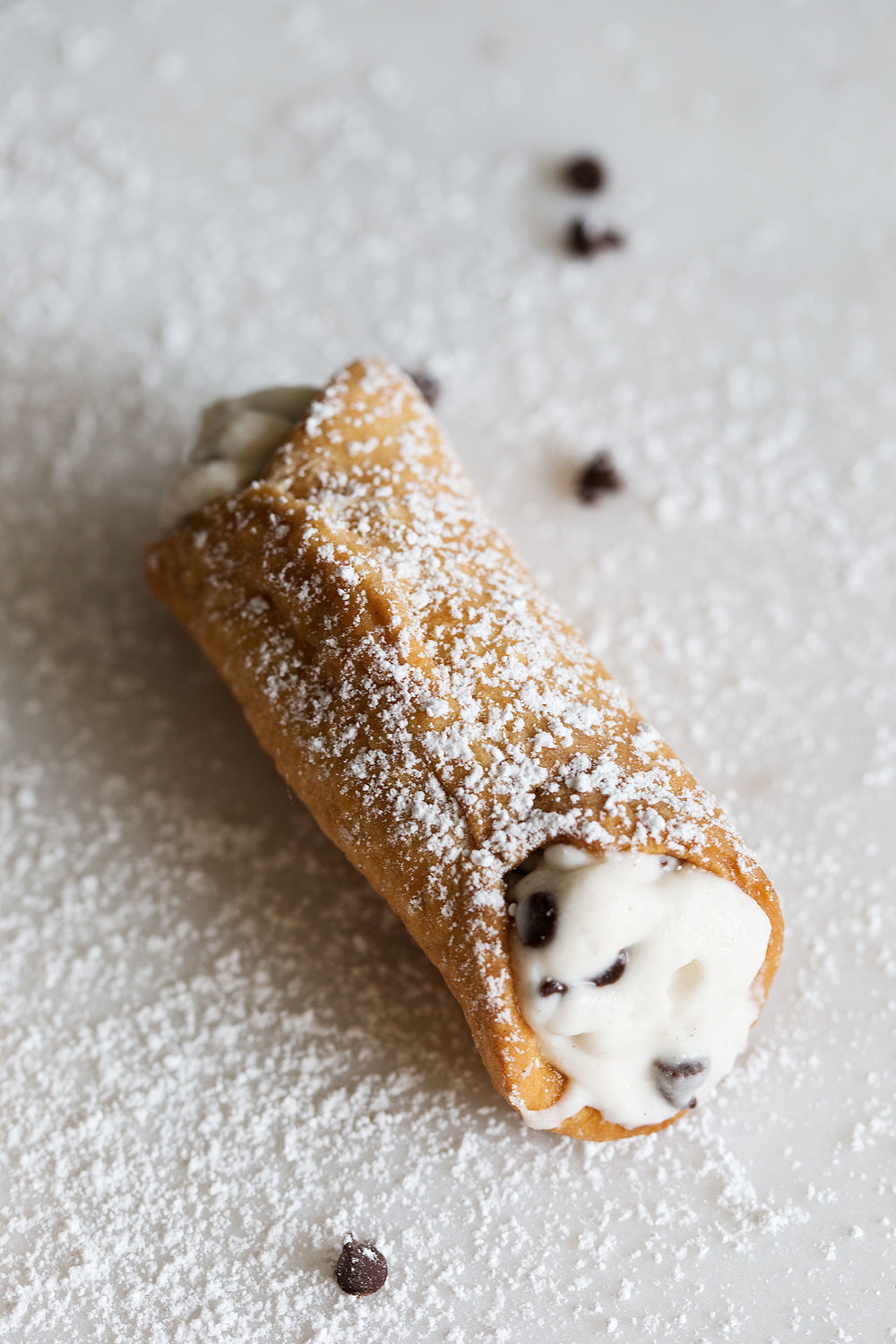 homemade cannoli with mascarpone filling and chocolate chips