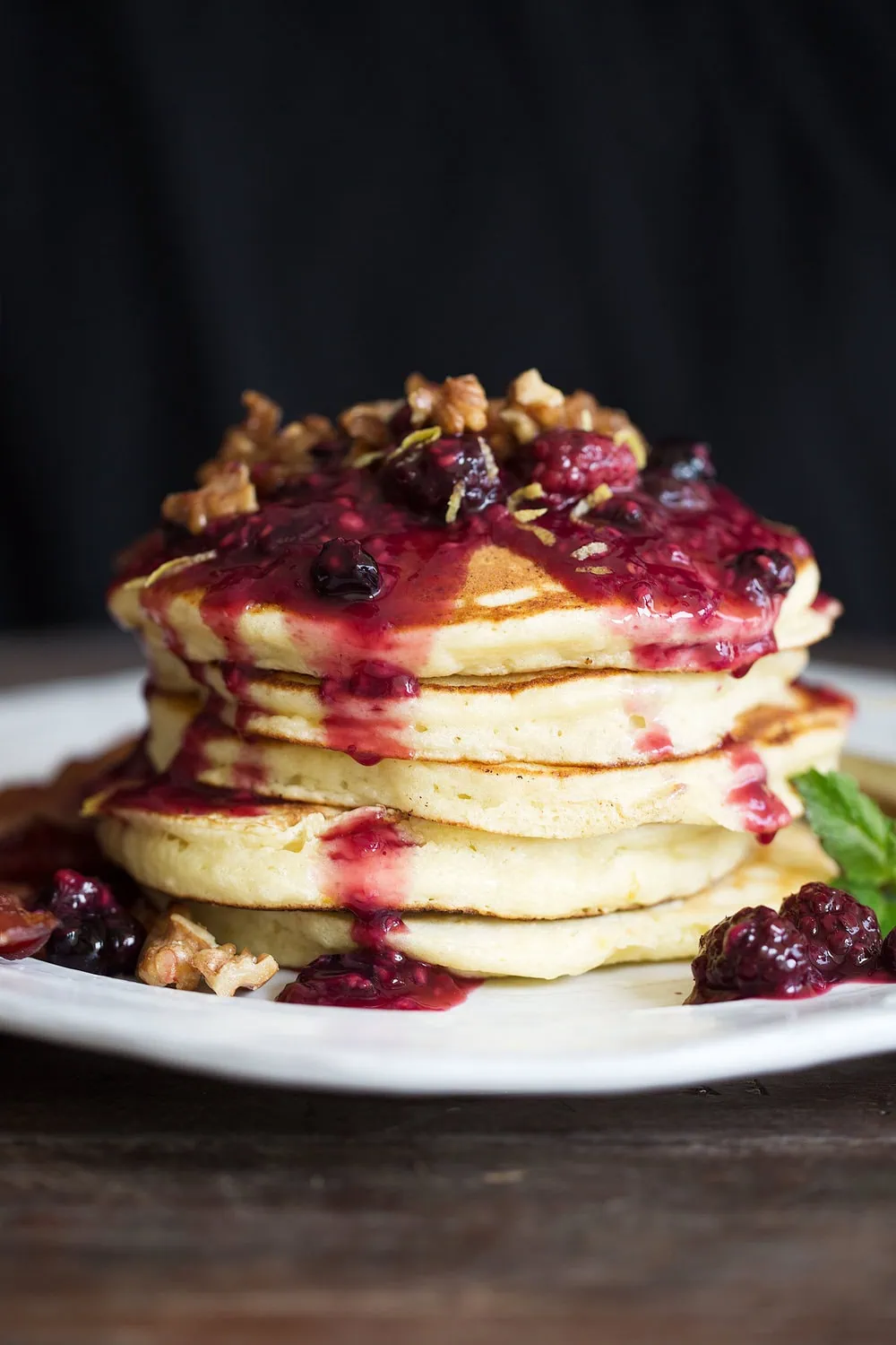 lemon ricotta pancakes with mixed berry compote and candied walnuts