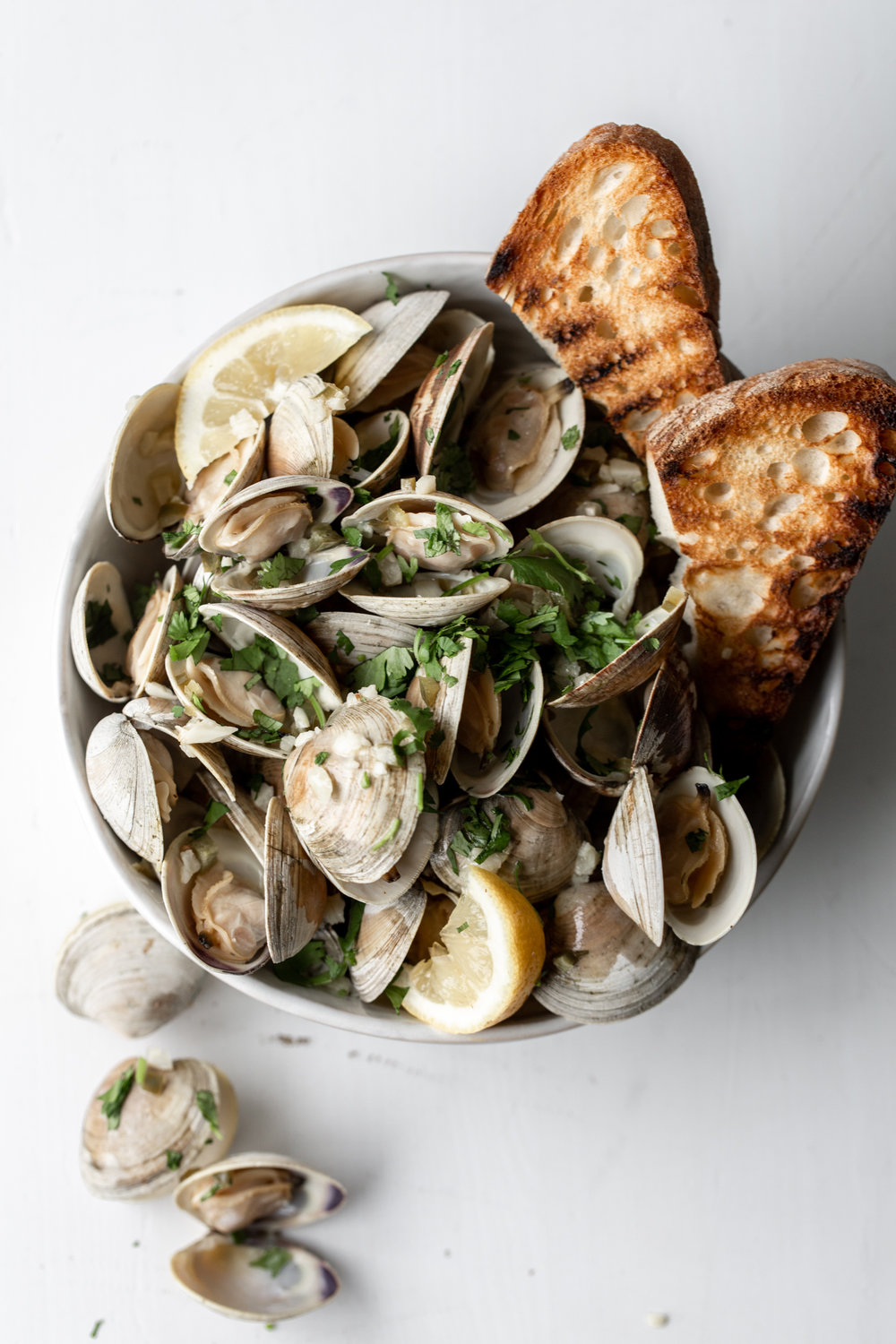 Clams in White Wine Sauce with Serrano Garlic Butter and Grilled Bread