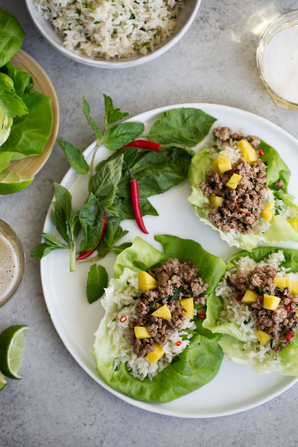 thai pork lettuce wraps with coconut fried rice and mango