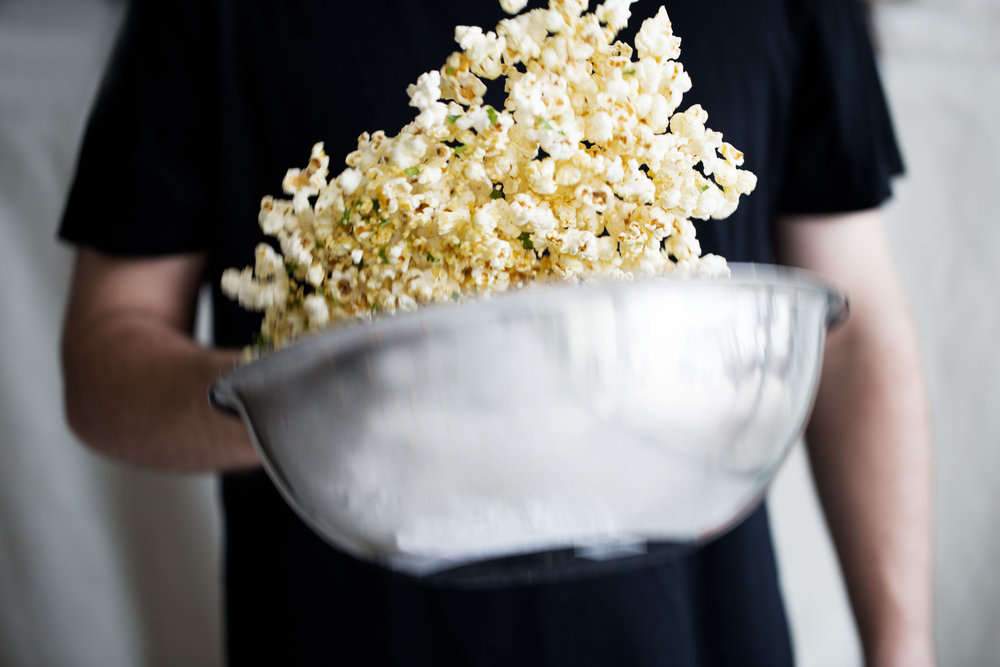 cheesy popcorn toss in bowl