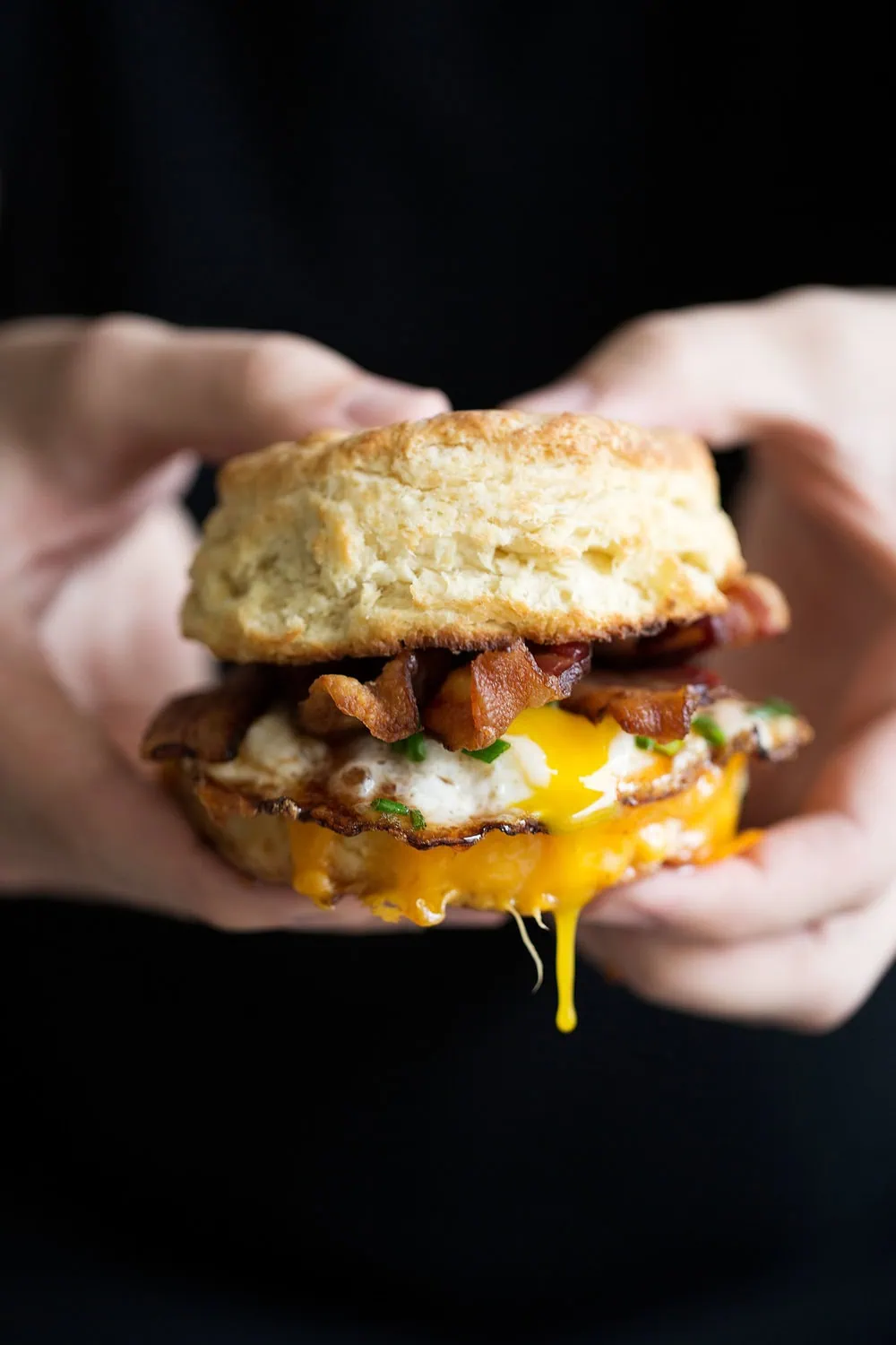 bacon, egg and cheese biscuit with sriracha honey