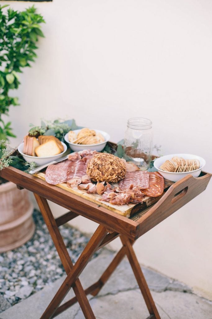 charcuterie board with pimento cheese ball.
