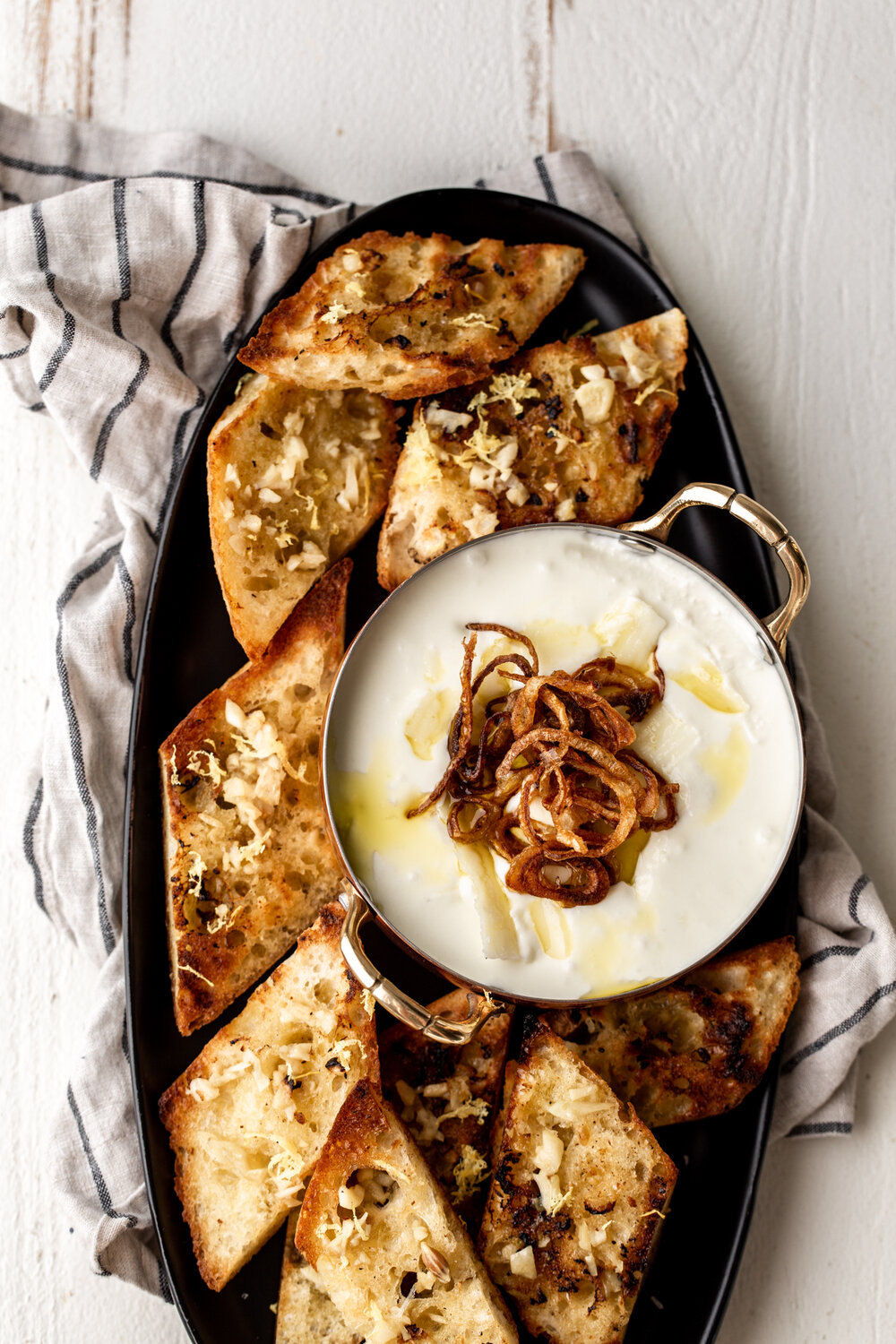 whipped pecorino dip topped with crispy fried shallots