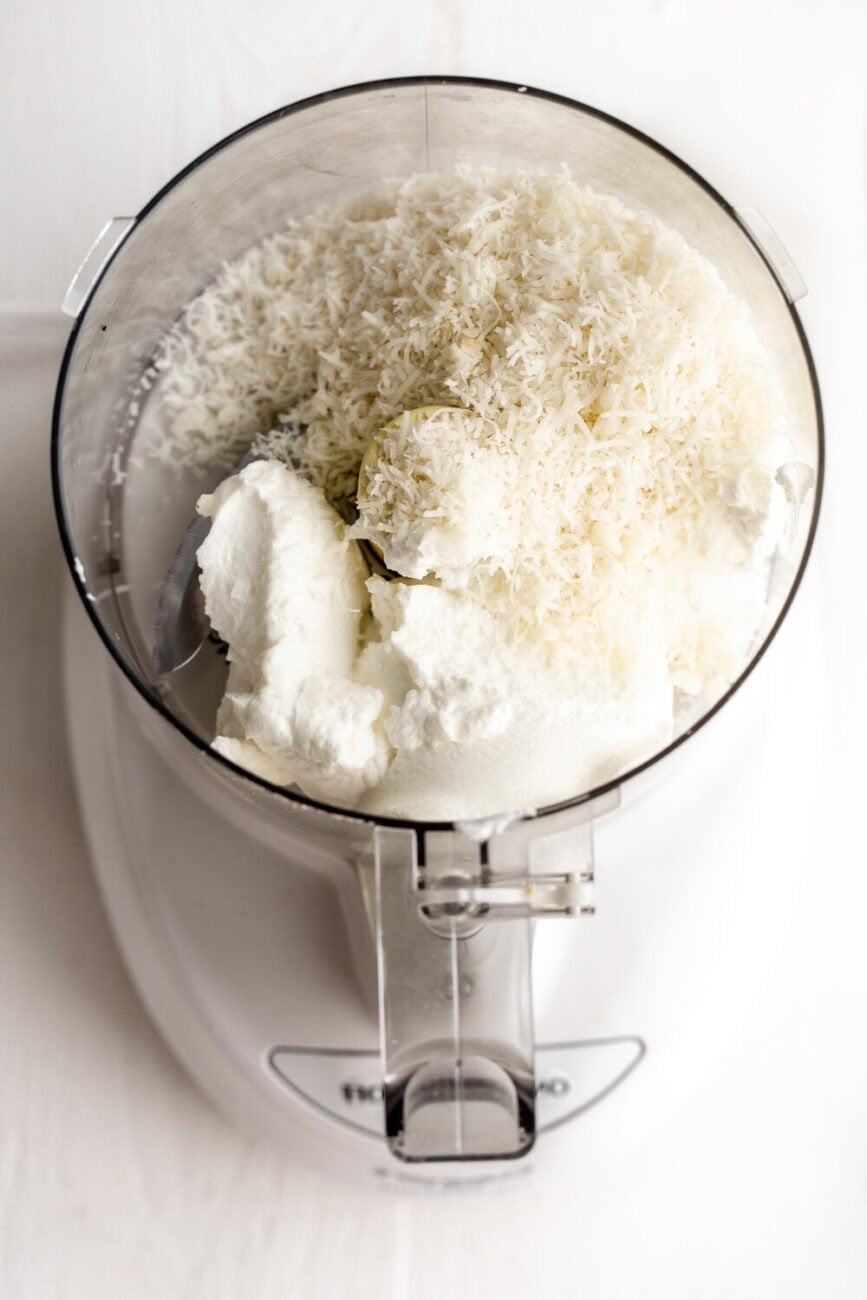 whipped pecorino dip ingredients greek yogurt and cheese in food processor.