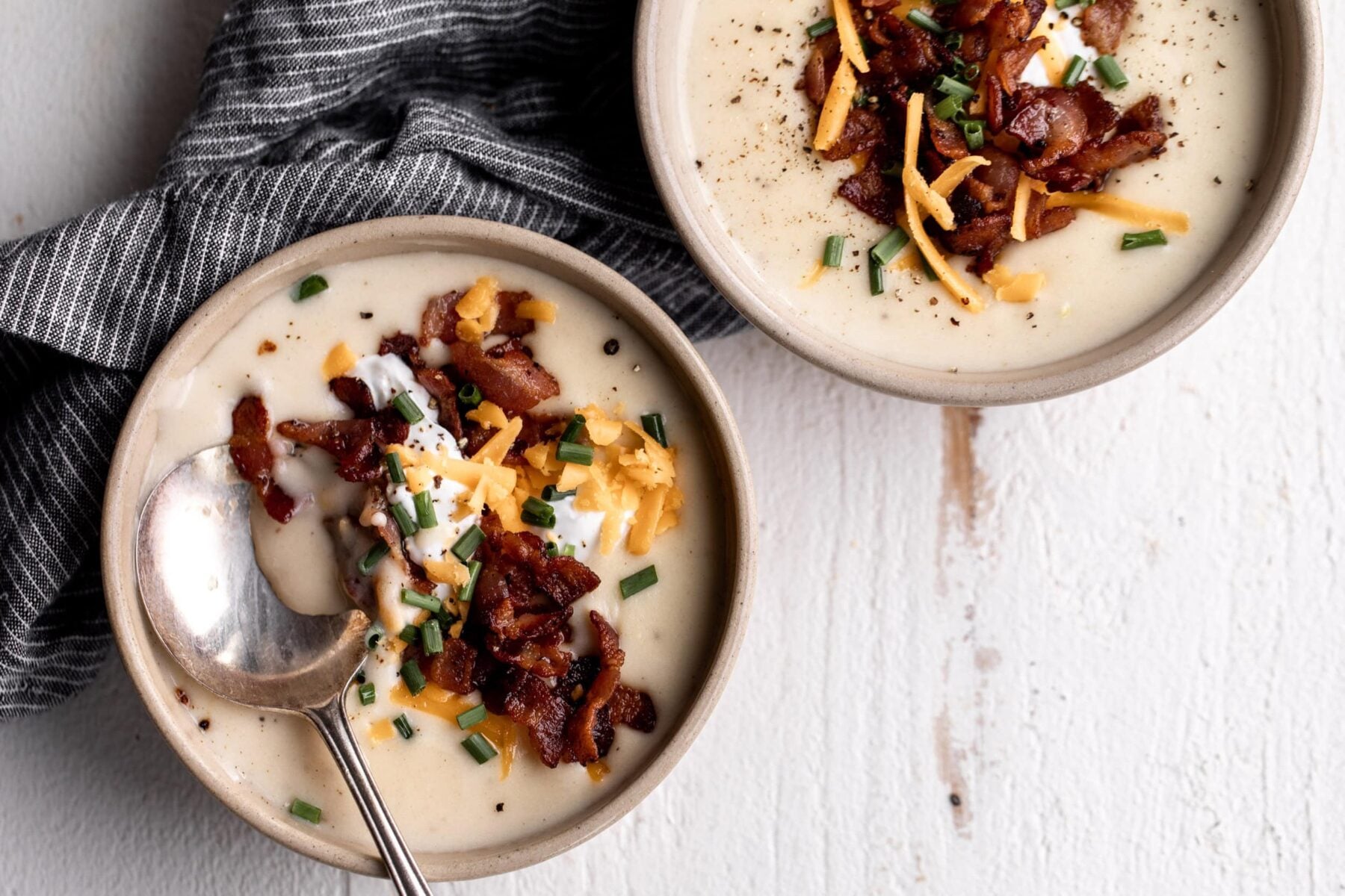 creamy loaded baked potato soup topped with bacon.