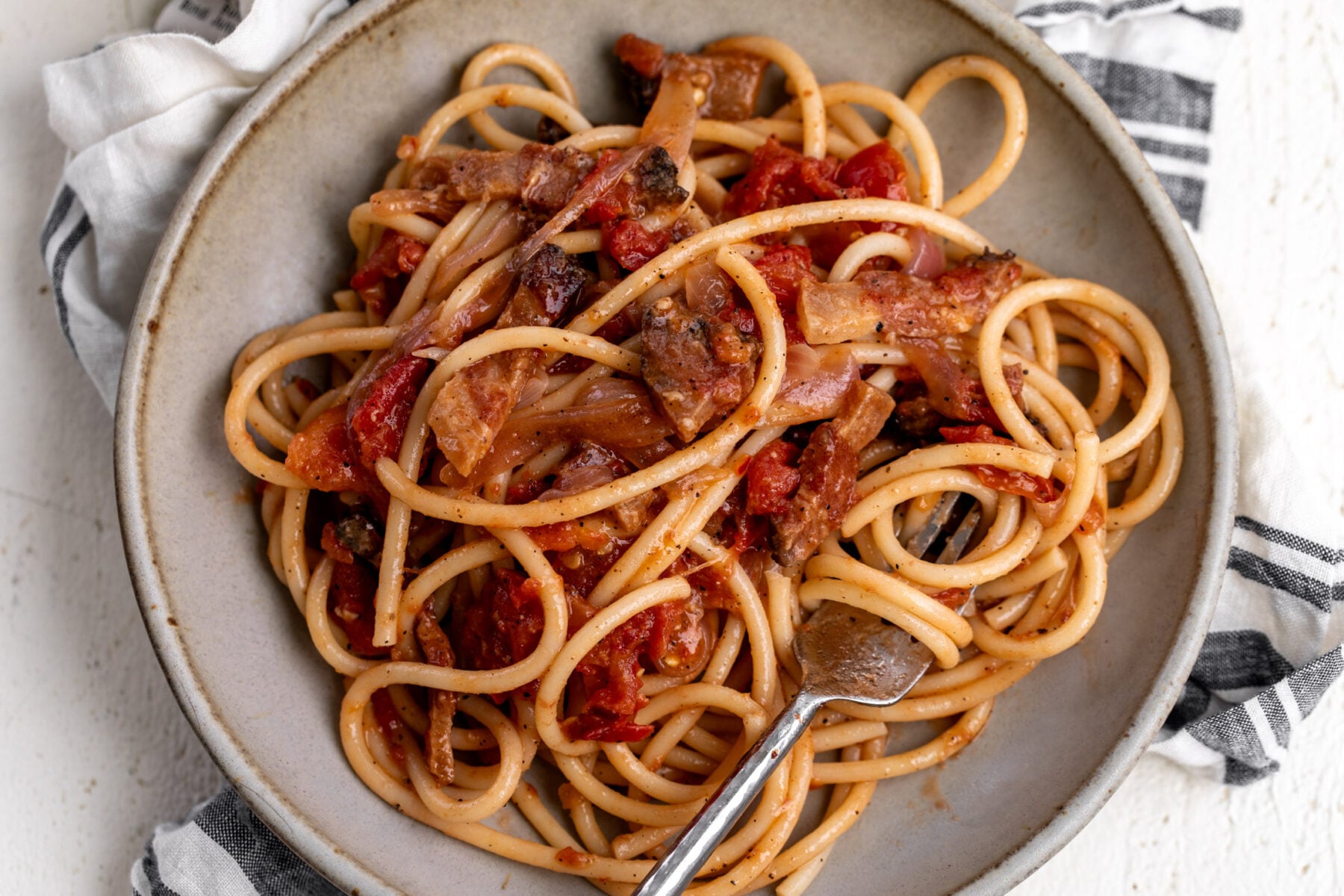 bucatini all'amatriciana pasta noodles.