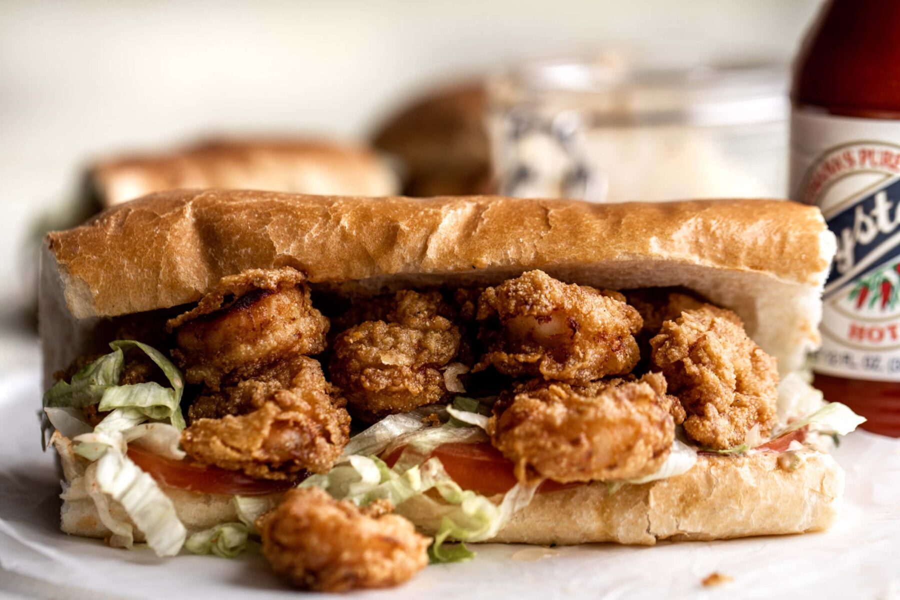 fried shrimp po boy sandwich with cajun remoulade.