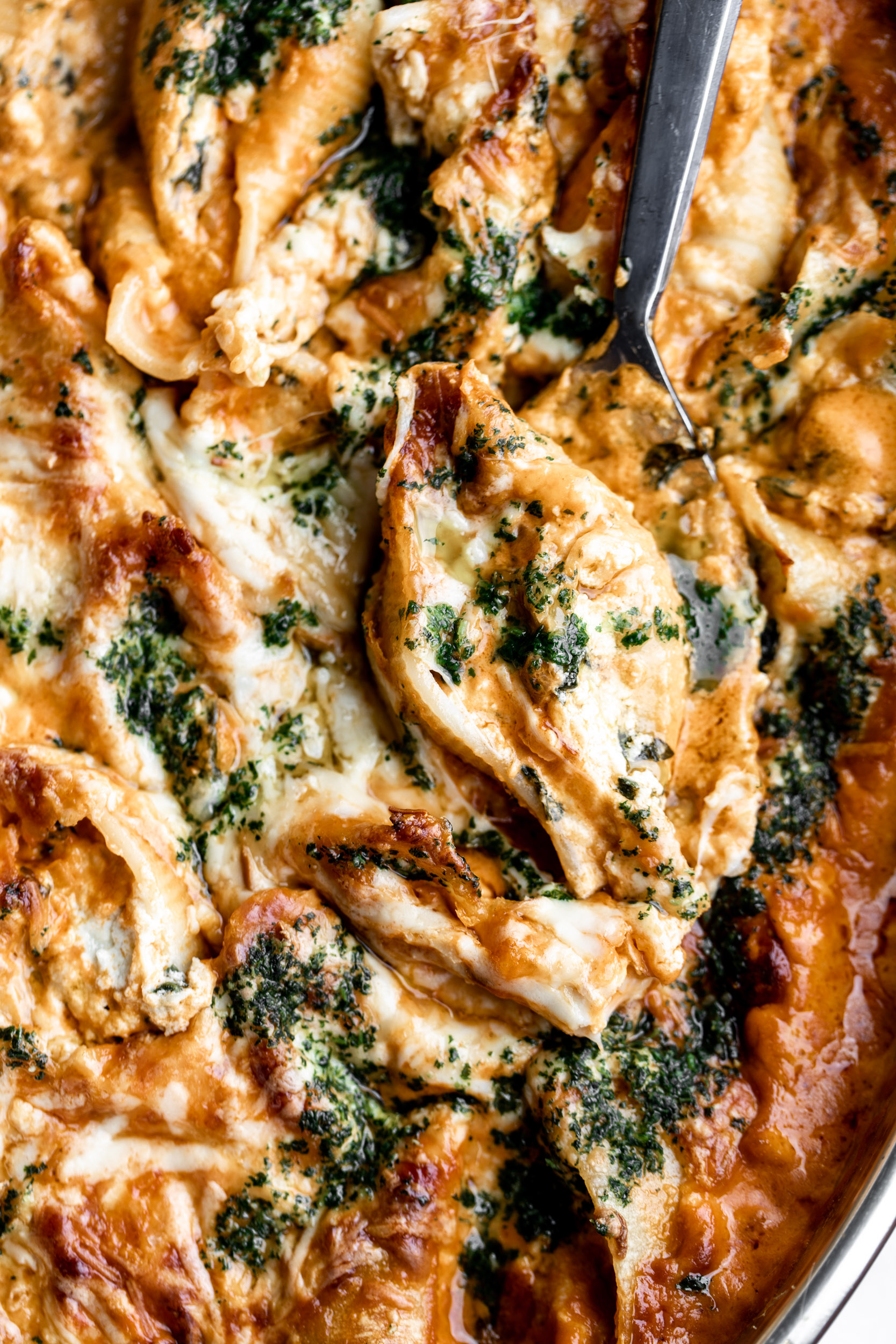 Baked Stuffed Shells in Vodka Sauce with Pesto Oil and Smoked Mozzarella