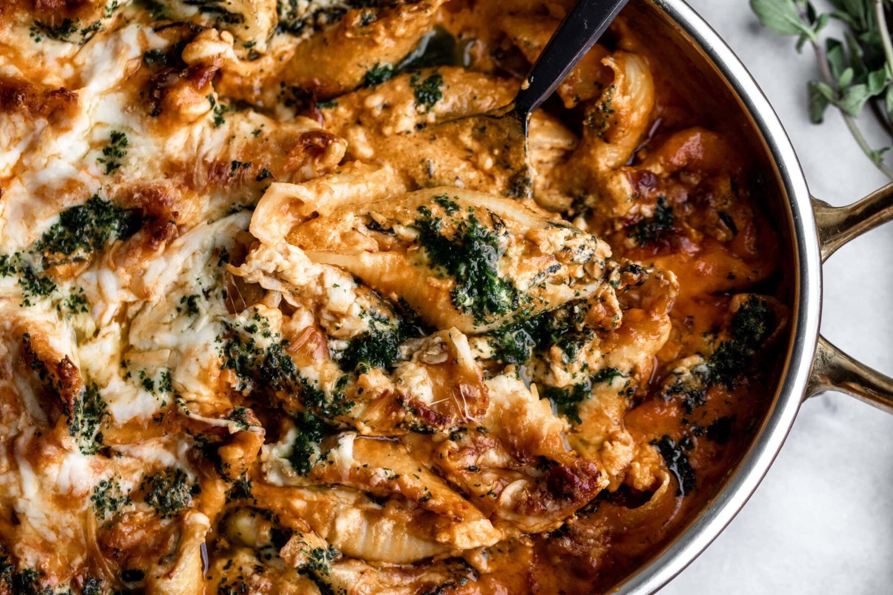 Baked Stuffed Shells in Vodka Sauce with Pesto Oil and Smoked Mozzarella