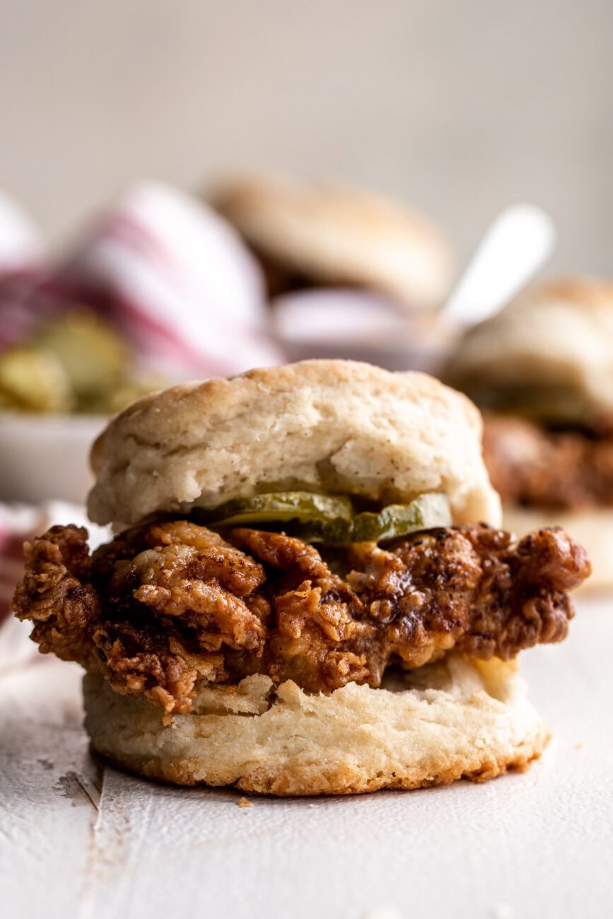hot honey butter chicken biscuit with pickles.