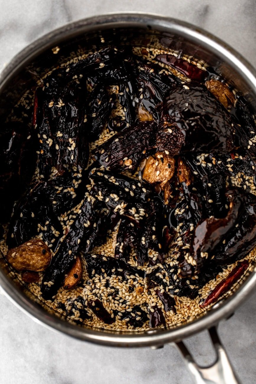 simmered chilies and garlic in pot salsa macha.